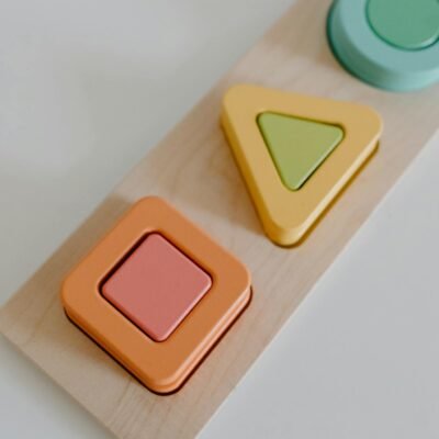 A vibrant educational toy that enhances children's learning with colorful wooden shapes.