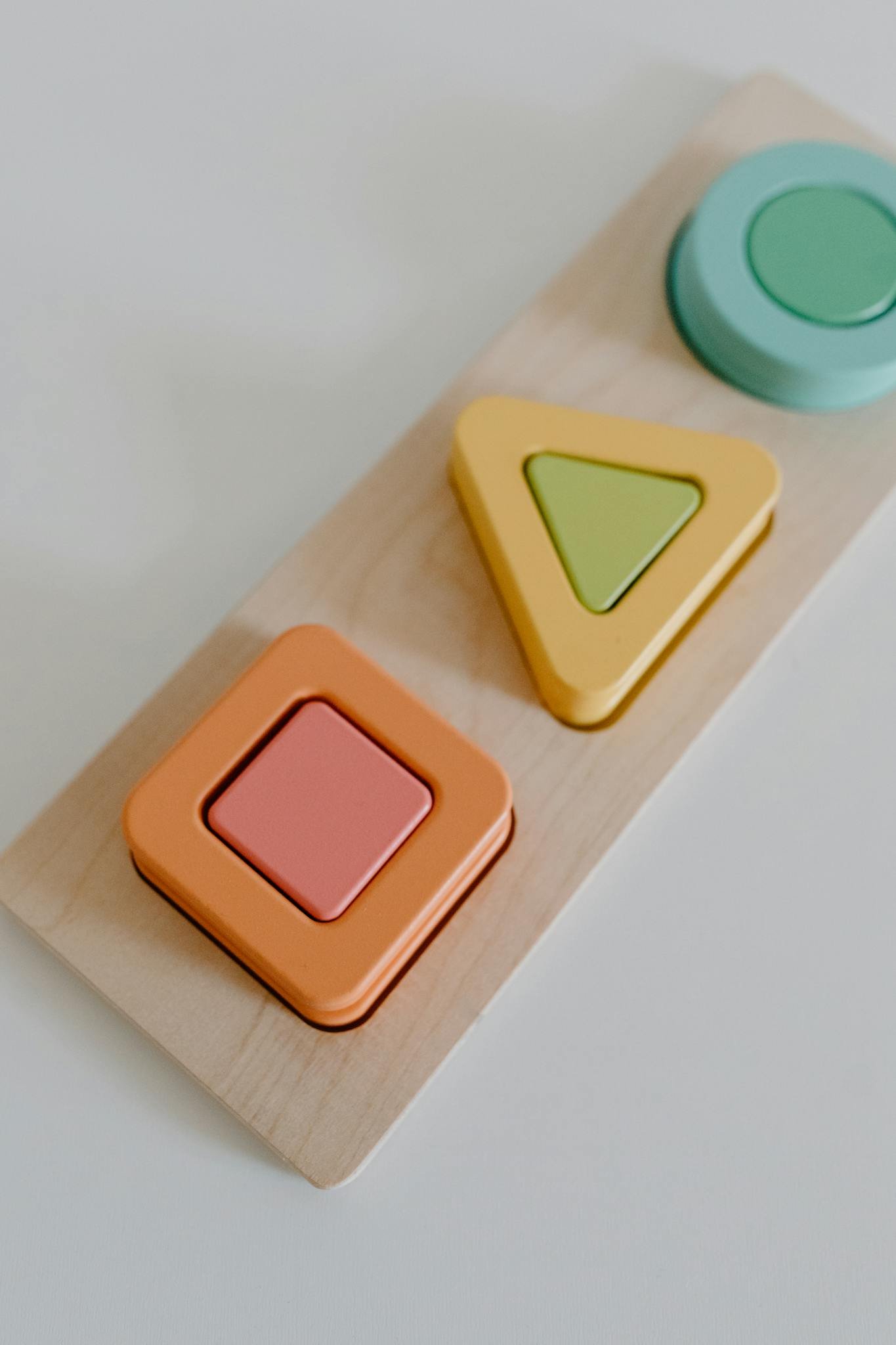 A vibrant educational toy that enhances children's learning with colorful wooden shapes.